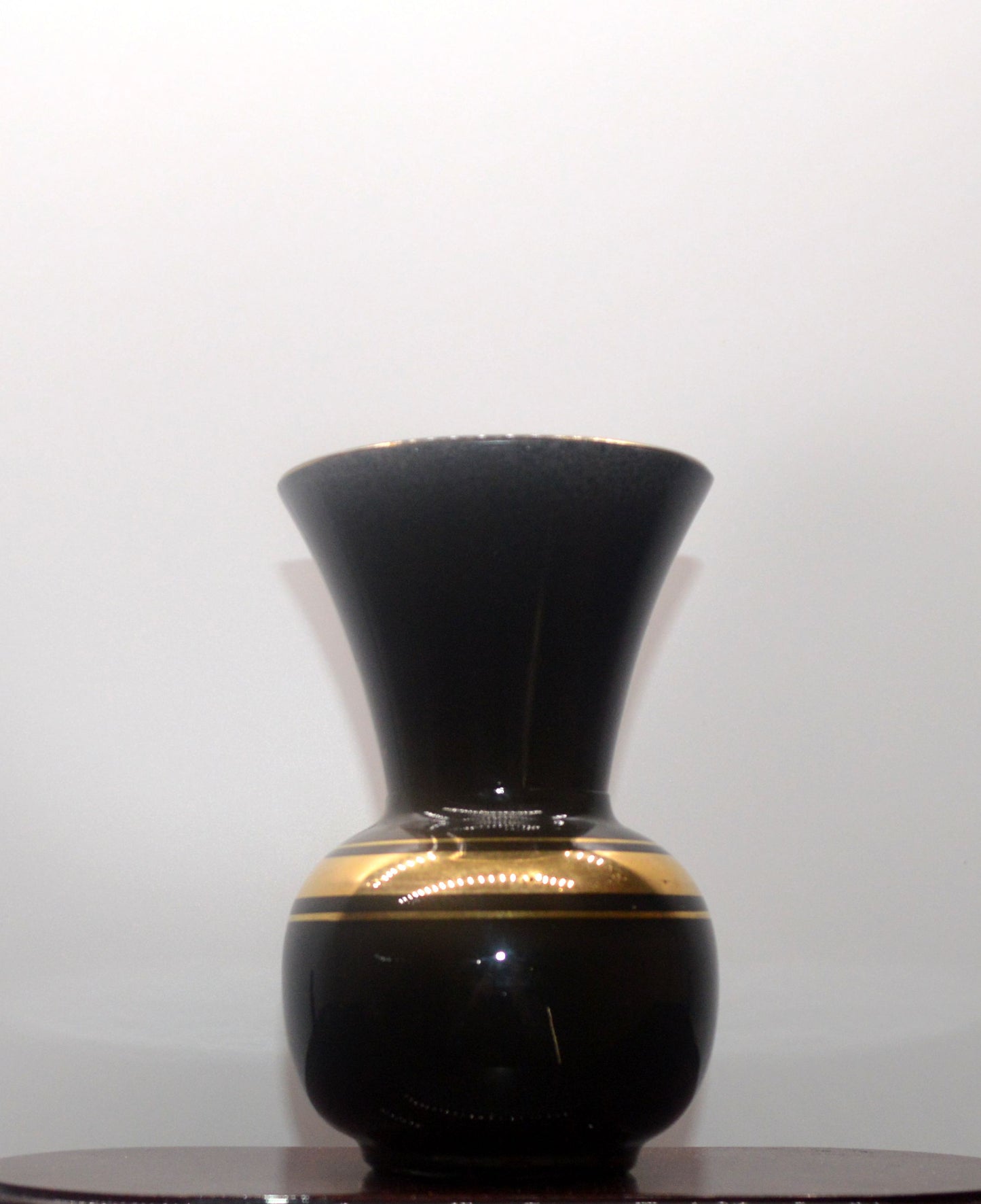 TWO VINTAGE FRENCH BLACK AND GOLD VASES