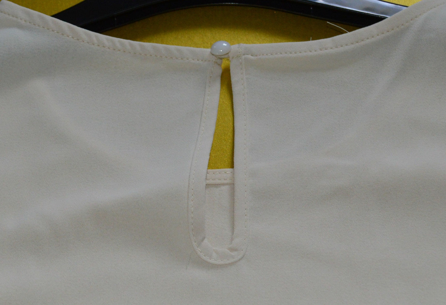 button closure at back