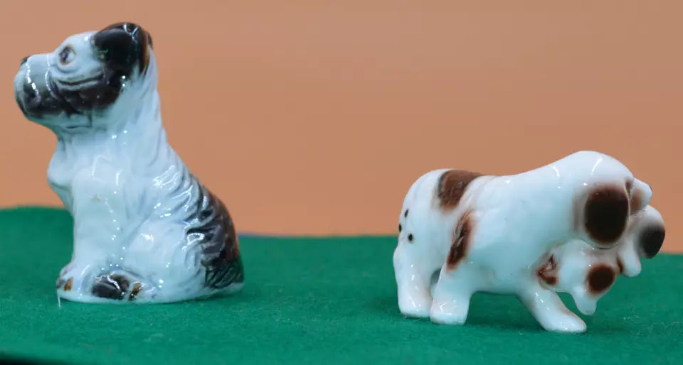 Two Collectible Miniature Dog Figurines – Different Breeds