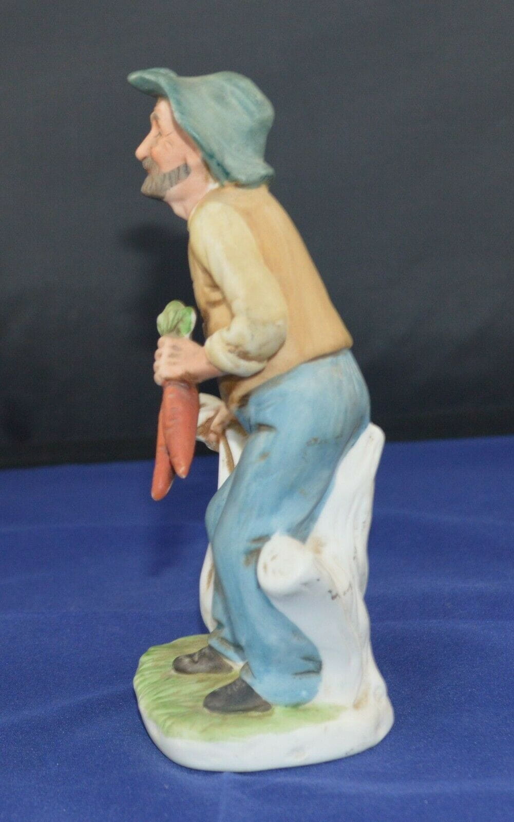DECORATIVE FIGURINE MAN WITH CARROTS(PREVIOUSLY OWNED)GOOD CONDITION - TMD167207
