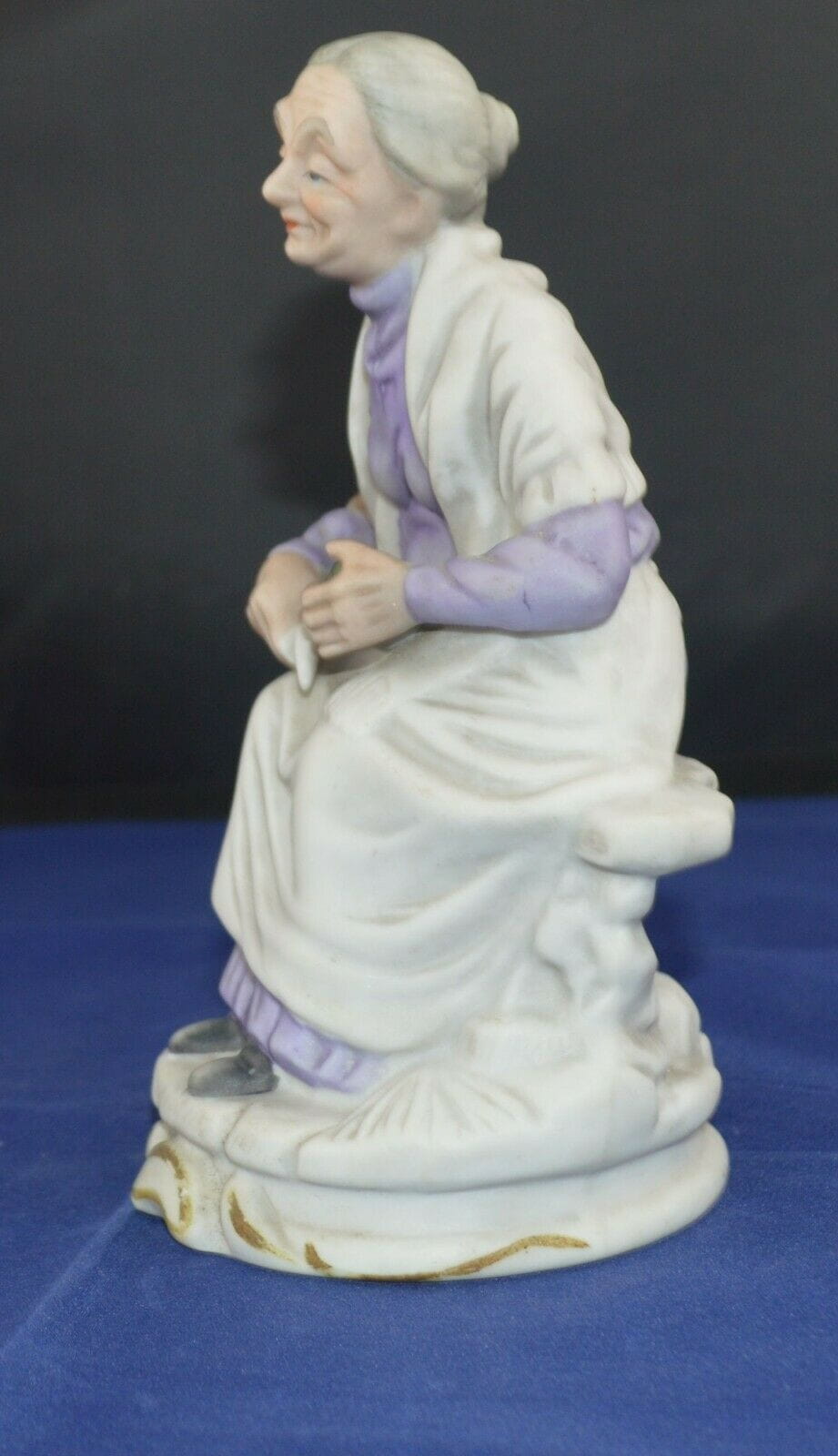 DECORATIVE FIGURINES MAN SITTING READING & A LADY IN A LILAC DRESS(PREVIOUSLY OWNED) GOOD CONDITION - TMD167207
