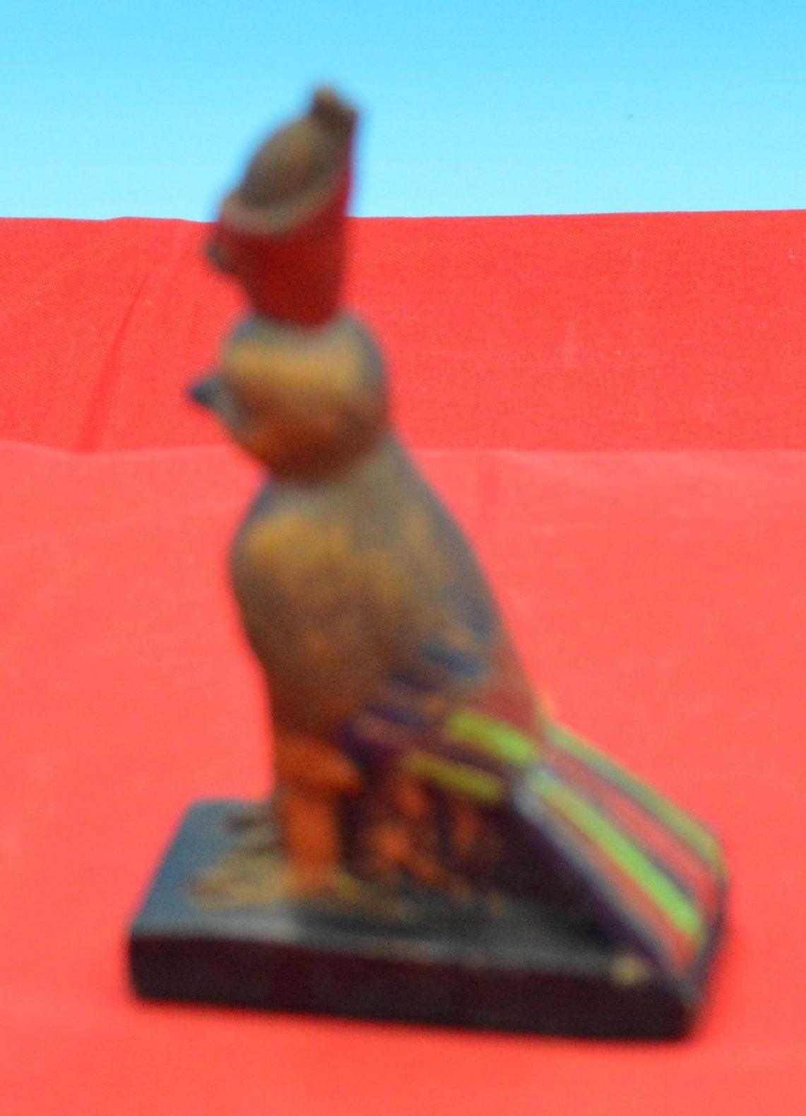 FOUR EGYPTIAN THEMED DECORATIVE ORNAMENTS - TMD167207