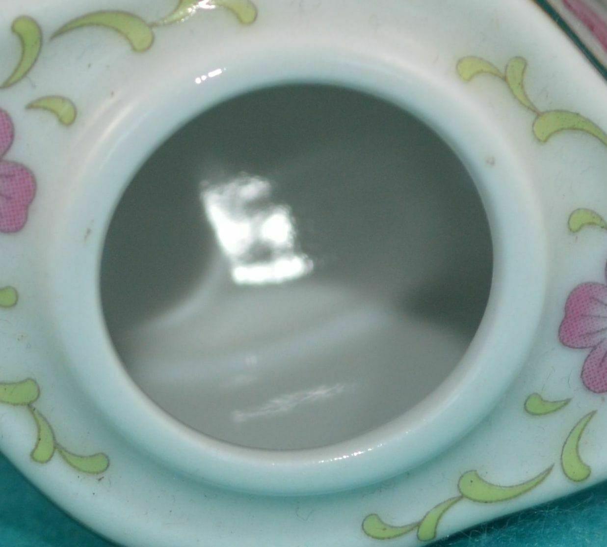 PORCELAIN ART THE MINIATURE TEAPOT COLLECTION WITH GREEN LID AND PINK FLOWERS HAS TAG(PREVIOUSLY OWNED) VERY GOOD CONDITION - TMD167207