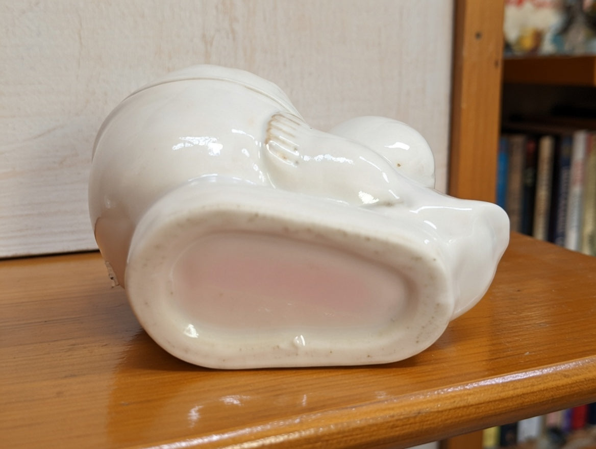 Bottom view of vintage ceramic chick egg planter small decorative plant pot