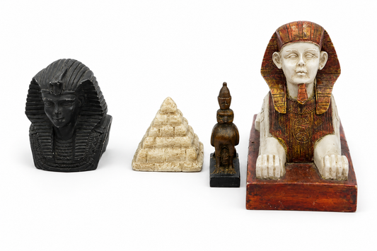 FOUR EGYPTIAN THEMED DECORATIVE ORNAMENTS