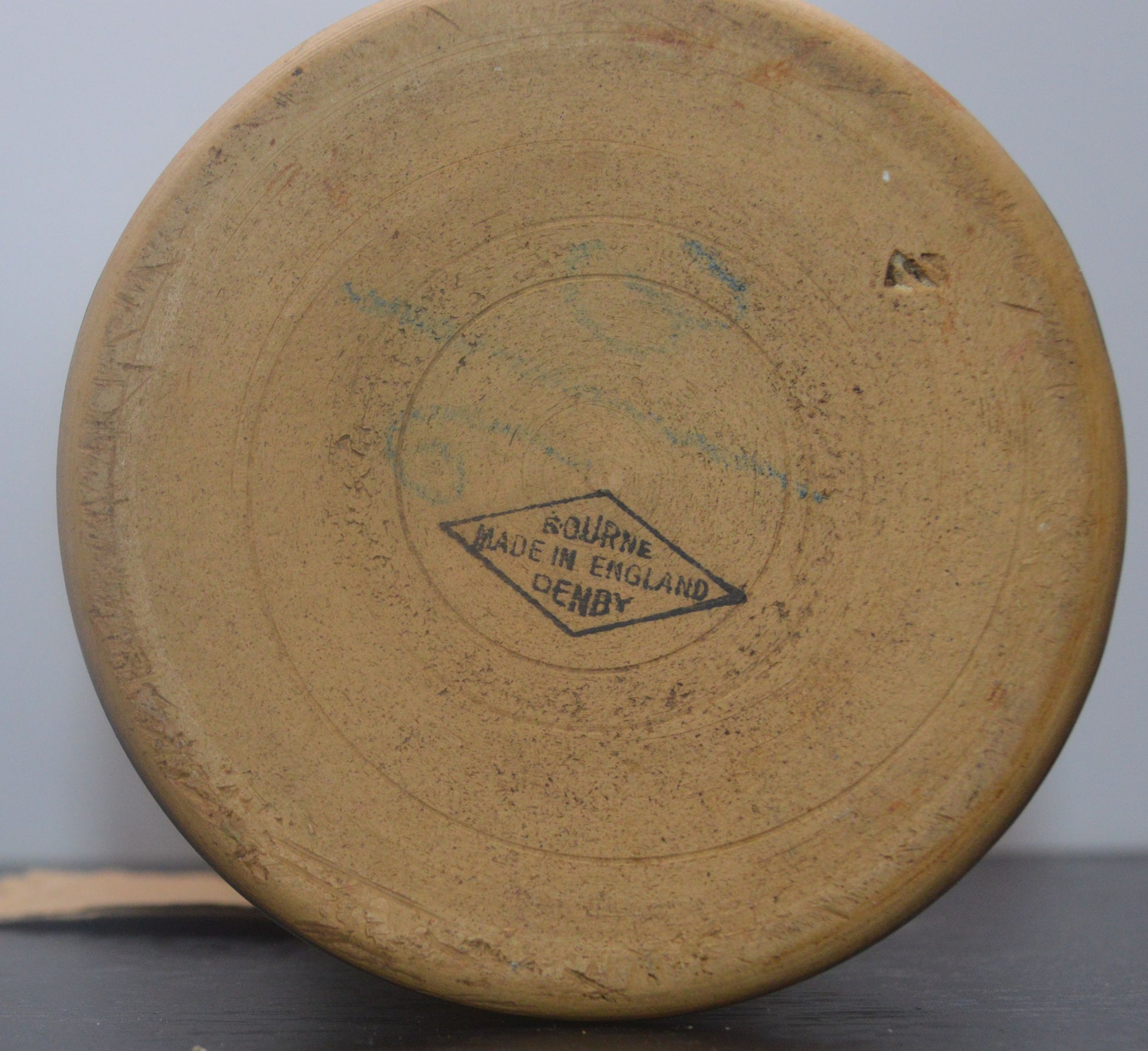 Base of Denby Bourne vase with 'Made in England' mark on unglazed ceramic.