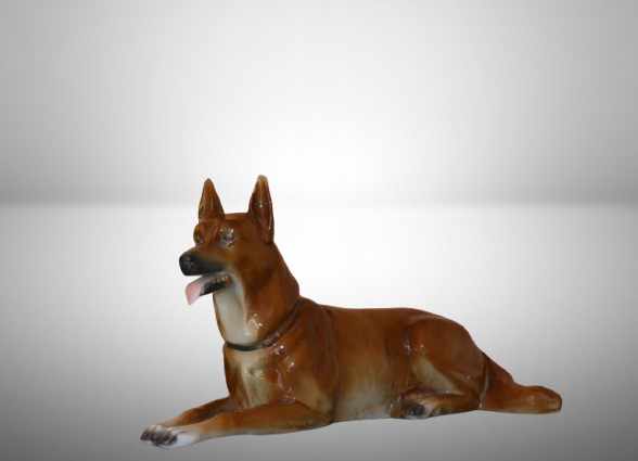 Ceramic dog figurine with perked ears, open mouth, pink tongue, and glossy finish. Front legs extended, back legs relaxed."