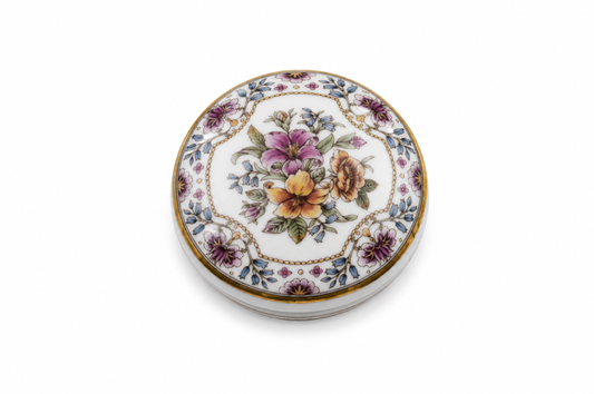 Vintage bone china Staffordshire trinket pot with floral pattern, white porcelain finish, and gold trim lid, decorative jewellery keepsake box.