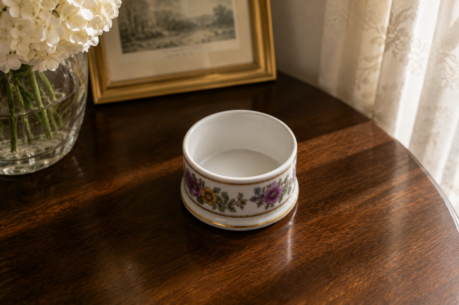 Vintage bone china Staffordshire trinket pot displayed on a wooden table in a bright home interior, showing decorative home décor styling and display inspiration.