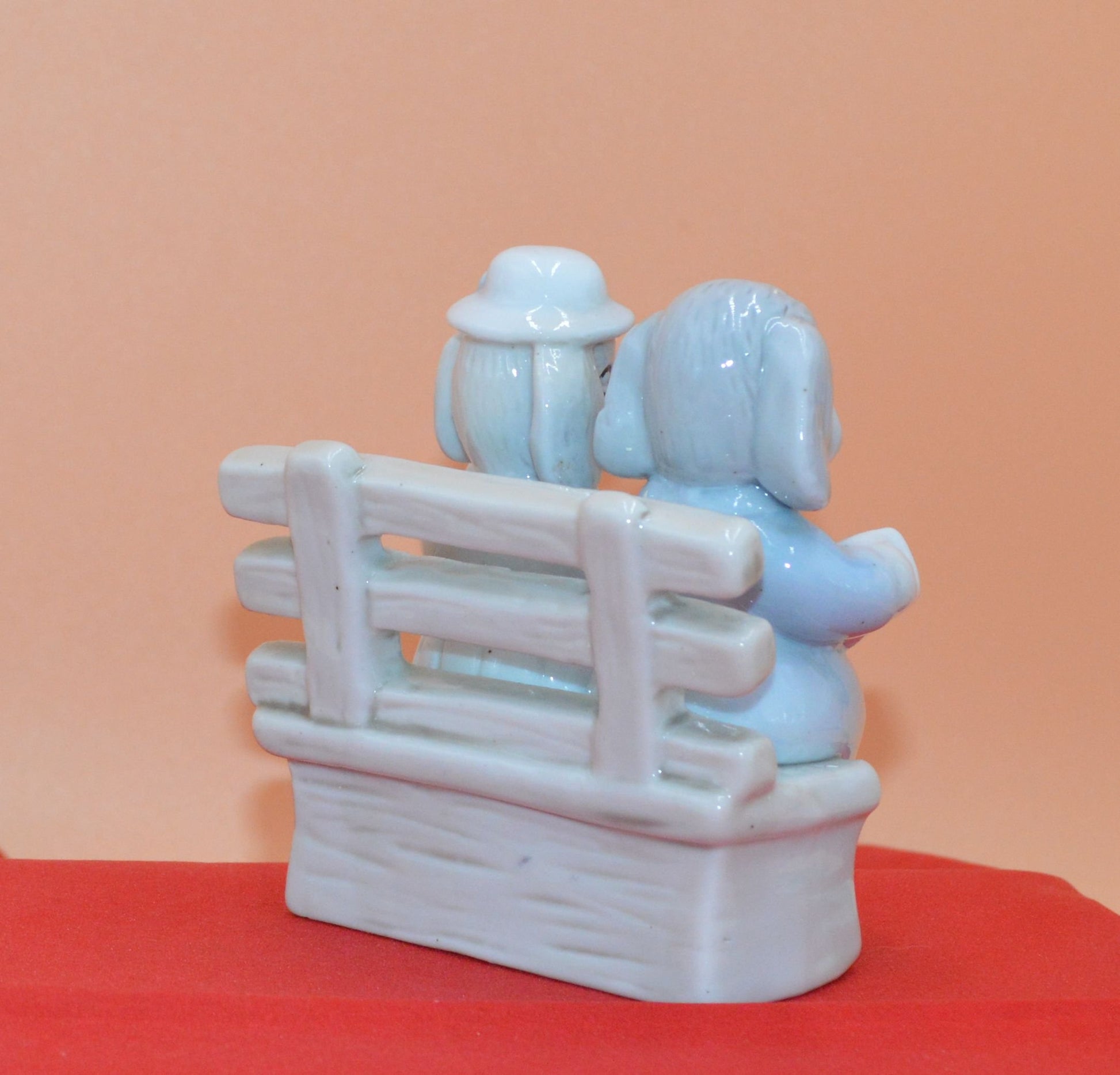 DOG COUPLE SITTING ON A BENCH - TMD167207