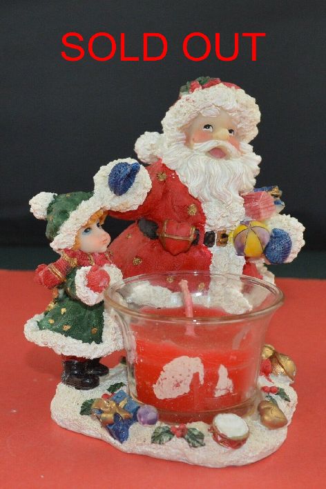 THE HOUSE OF VALENTINA SANTA CANDLE ORNAMENT WITH RED CANDLE