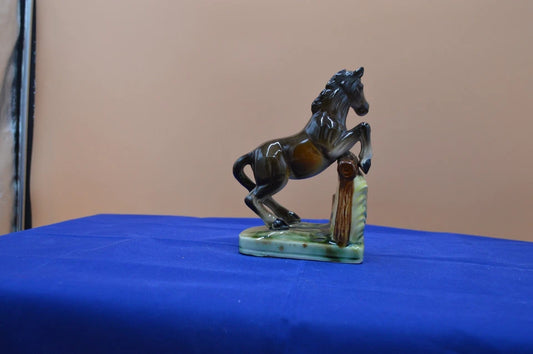 Unusual Foreign Horse Figurine in Action