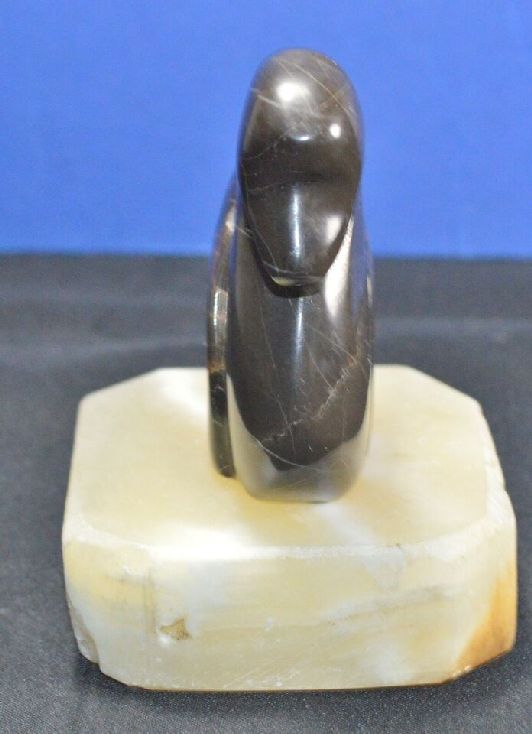 rock swan and base are in good condition