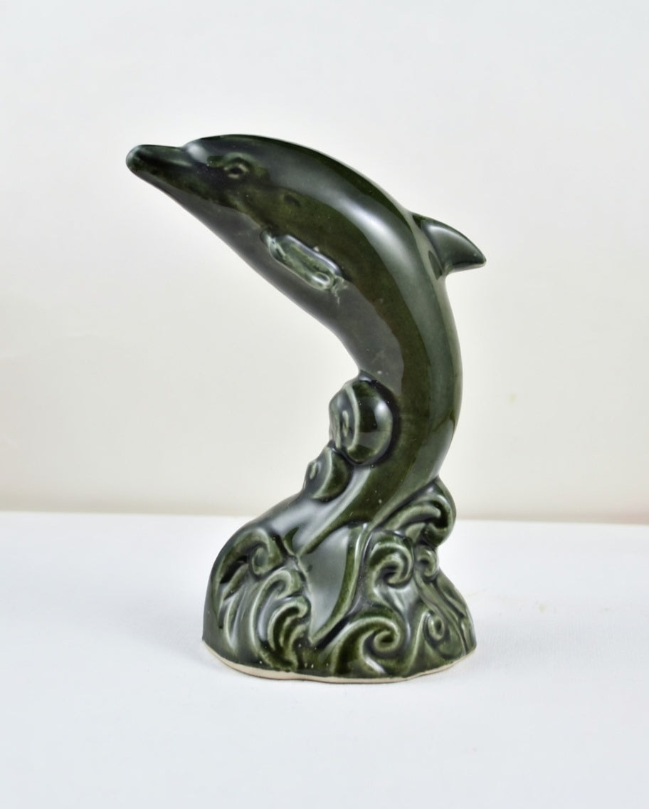 Vintage green ceramic dolphin figurine jumping over wave base decorative ornament