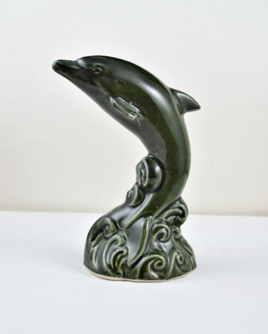 Vintage green ceramic dolphin figurine jumping over wave base decorative ornament