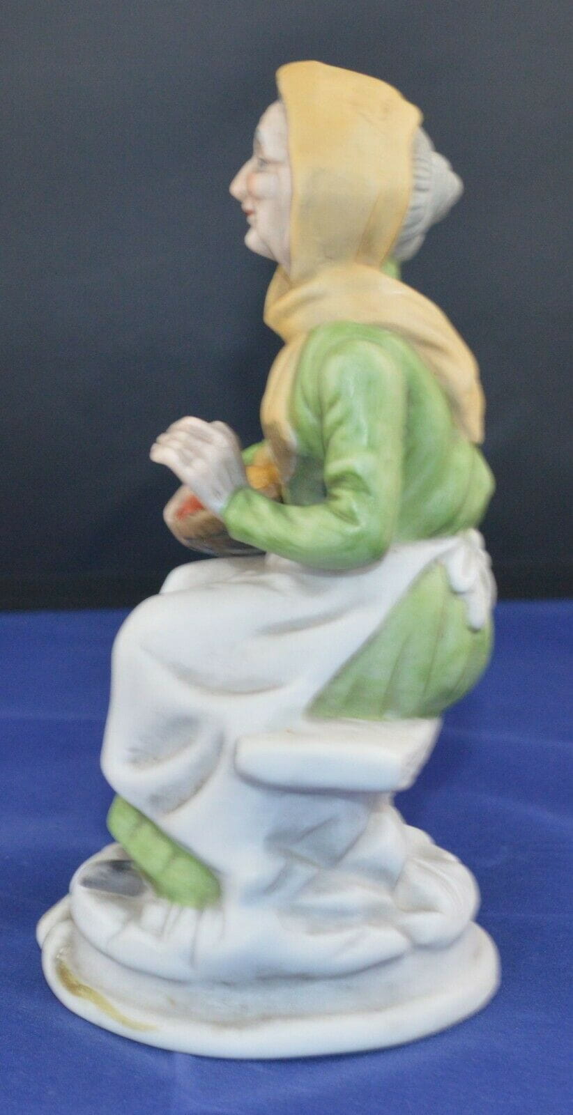 DECORATIVE FIGURINE LADY SITTING WITH A BASKET OF VEG(PREVIOUSLY OWNED)GOOD CONDITION - TMD167207