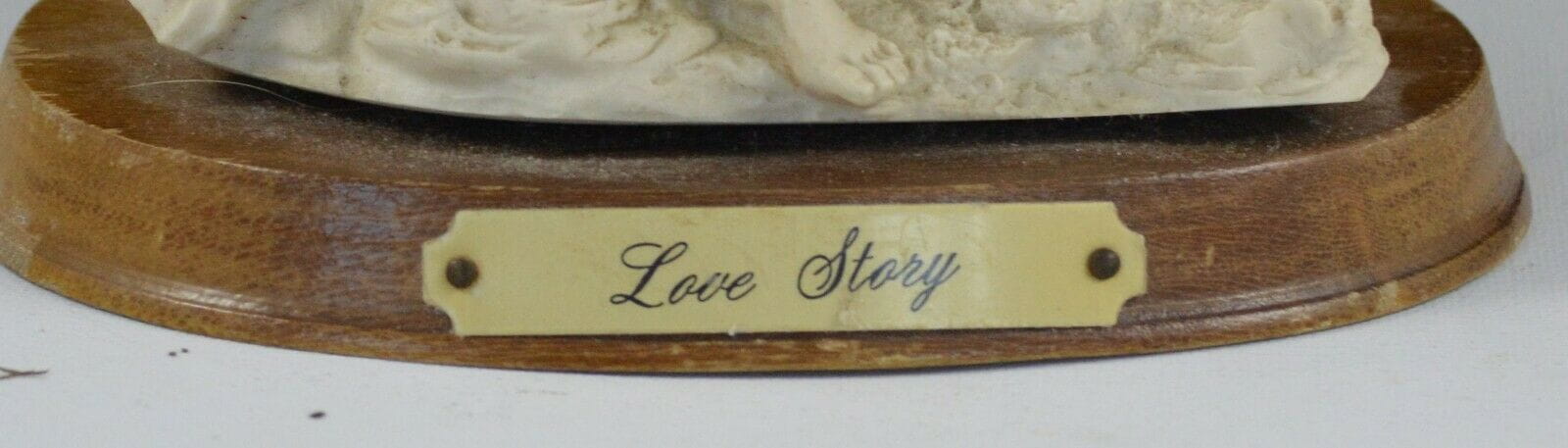 DECORATIVE FIGURINE MAN AND LADY FIGURINE ON WOODEN BASE TITLED LOVE STORY(PREVIOUSLY OWNED) GOOD CONDITION - TMD167207