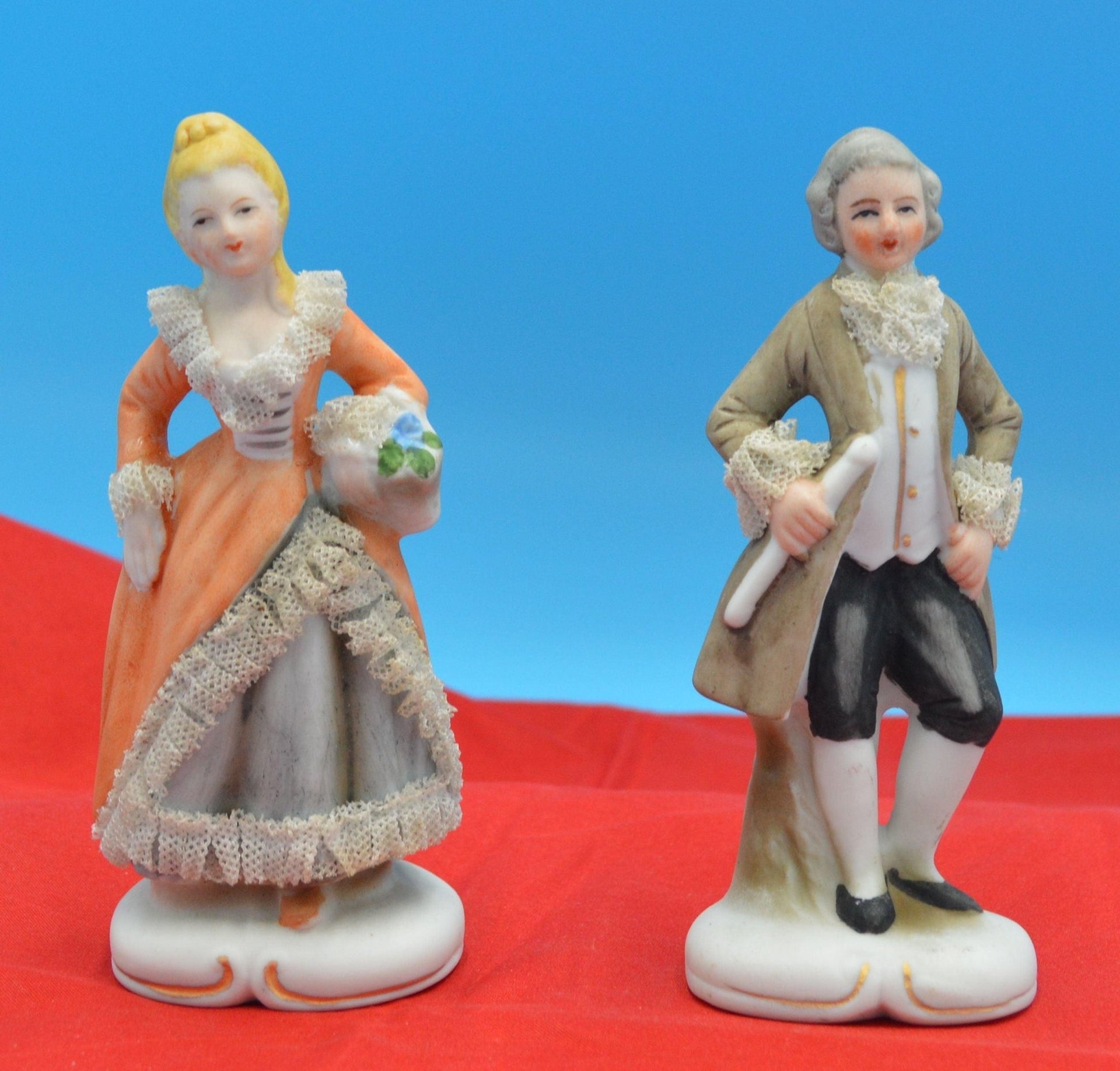 DECORATIVE FIGURINES A PAIR OF PERIOD STYLE FIGURINES - TMD167207