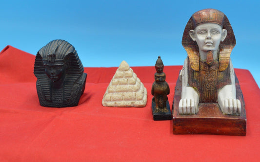 FOUR EGYPTIAN THEMED DECORATIVE ORNAMENTS - TMD167207