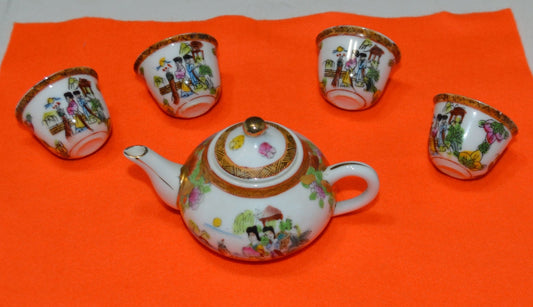 MINIATURE CHINESE TEAPOT AND FOUR CUPS(PREVIOUSLY OWNED) GOOD CONDITION - TMD167207