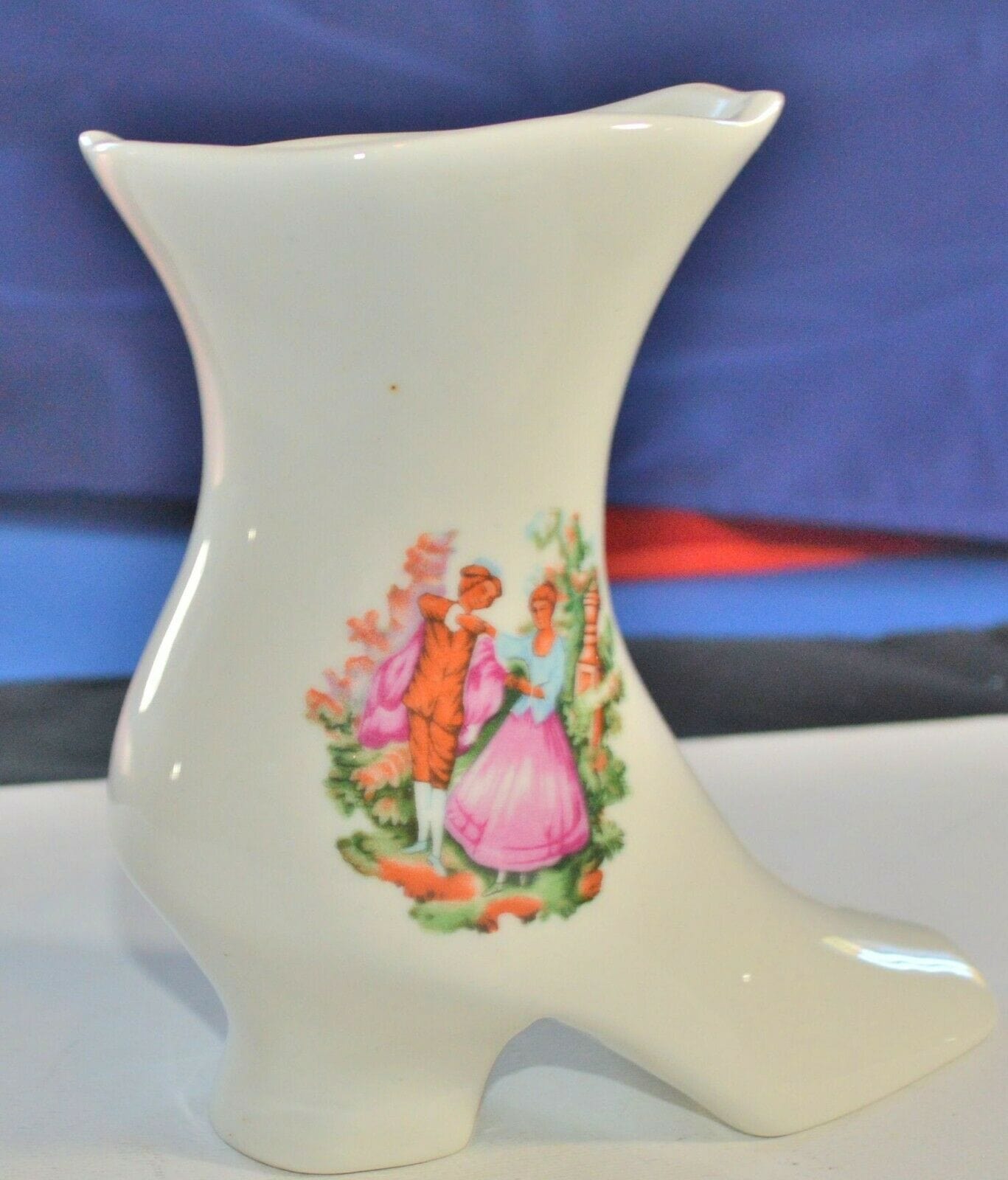 ORNAMENTAL BOOT DEPICTING A PERIOD STYLE COURTING COUPLE(PREVIOUSLY OWNED) GOOD CONDITION - TMD167207