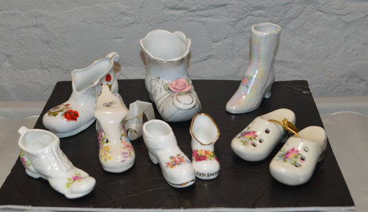 ORNAMENTAL BOOTS WITH A FLORAL DESIGN SEVEN SINGLE BOOTS AND ONE PAIR OF CLOGS(PREVIOUSLY OWNED) GOOD CONDITION - TMD167207