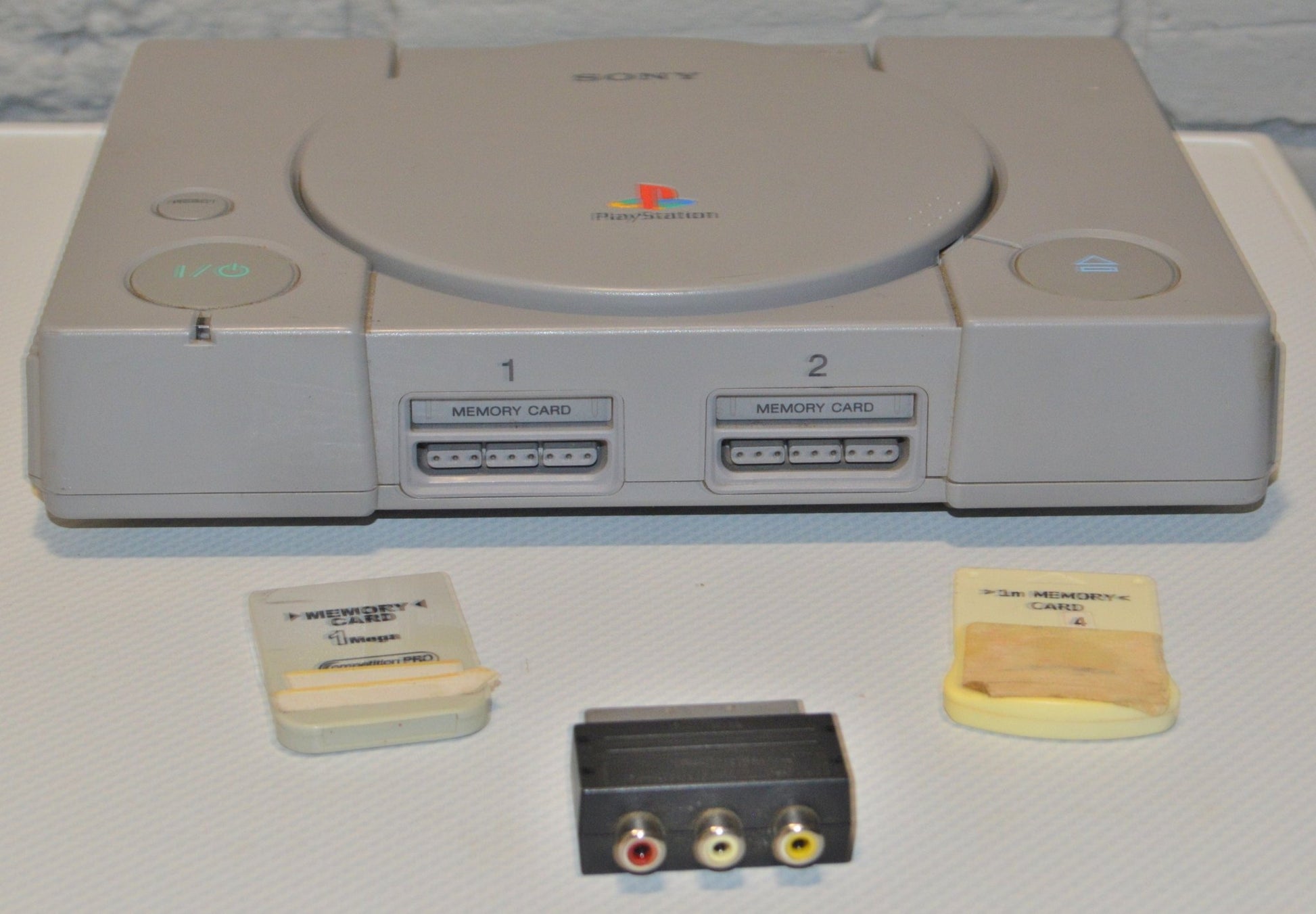 PLAYSTATION, THREE CONTROLLERS & TWO MEMORY CARDS(PREVIOUSLY OWNED) SPARE OR REPAIR - TMD167207