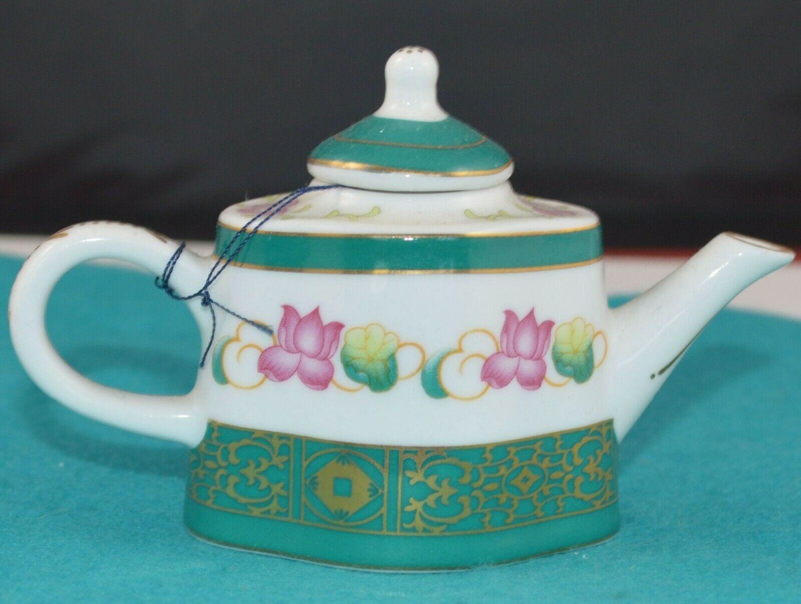 PORCELAIN ART THE MINIATURE TEAPOT COLLECTION WITH GREEN LID AND PINK FLOWERS HAS TAG(PREVIOUSLY OWNED)  - TMD167207