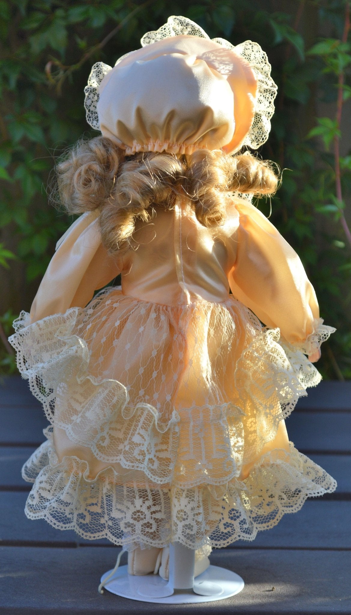 porcelain doll pink dress PORCELAIN DOLL IN A LIGHT PEACH DRESS