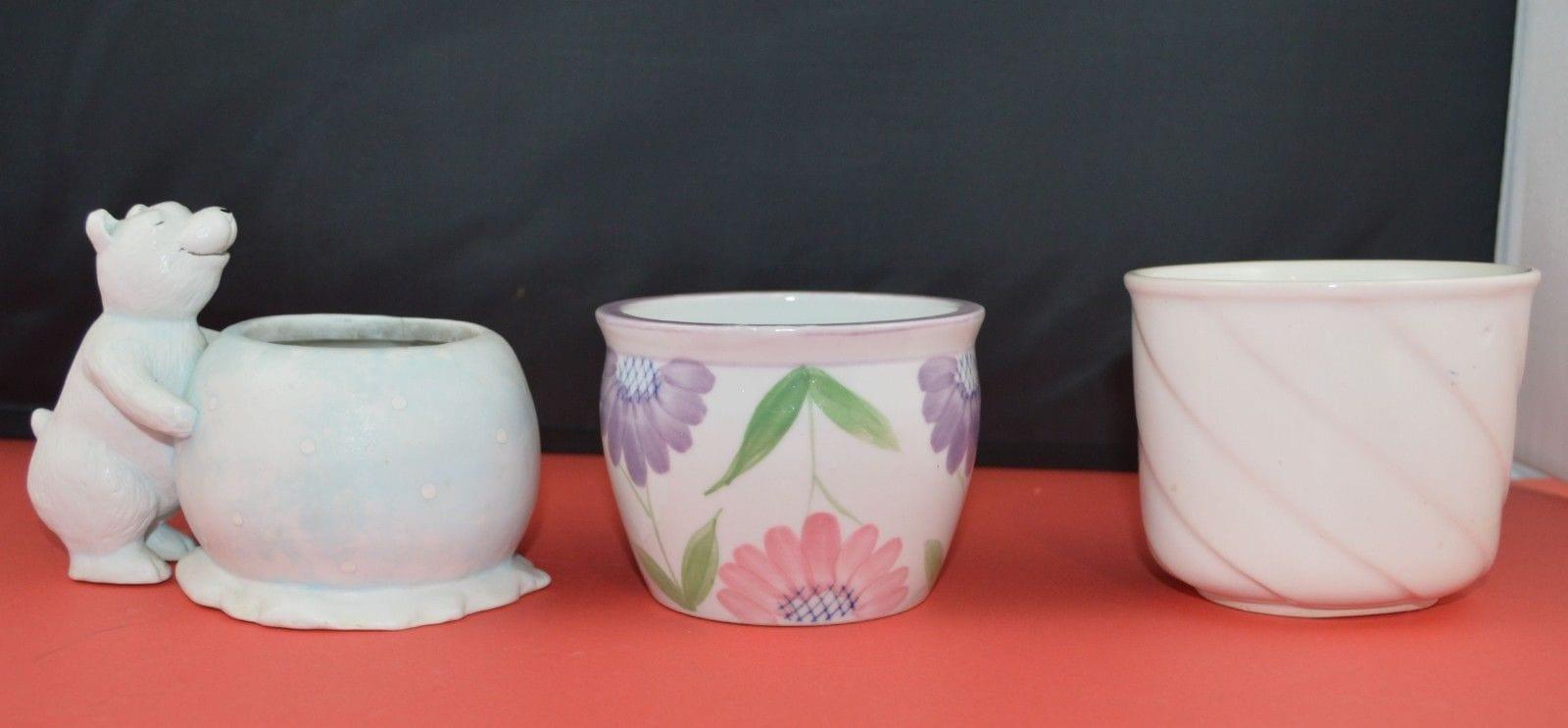 THREE POTTERY PLANTERS ONE WHITE ONE FLORAL ONE WITH A POLAR BEAR(PREVIOUSLY OWNED) GOOD CONDITION - TMD167207
