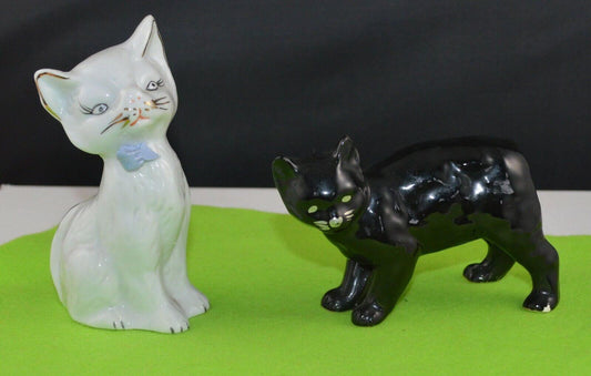 TWO DECORATIVE CAT FIGURINES ONE WHITE CAT AND ONE BLACK CAT - TMD167207