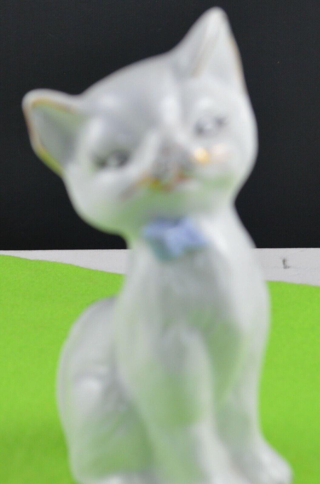 TWO DECORATIVE CAT FIGURINES ONE WHITE CAT AND ONE BLACK CAT - TMD167207