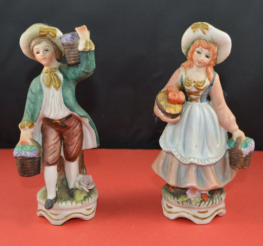 TWO DECORATIVE FIGURINES MALE & FEMALE FRUIT SELLERS - TMD167207